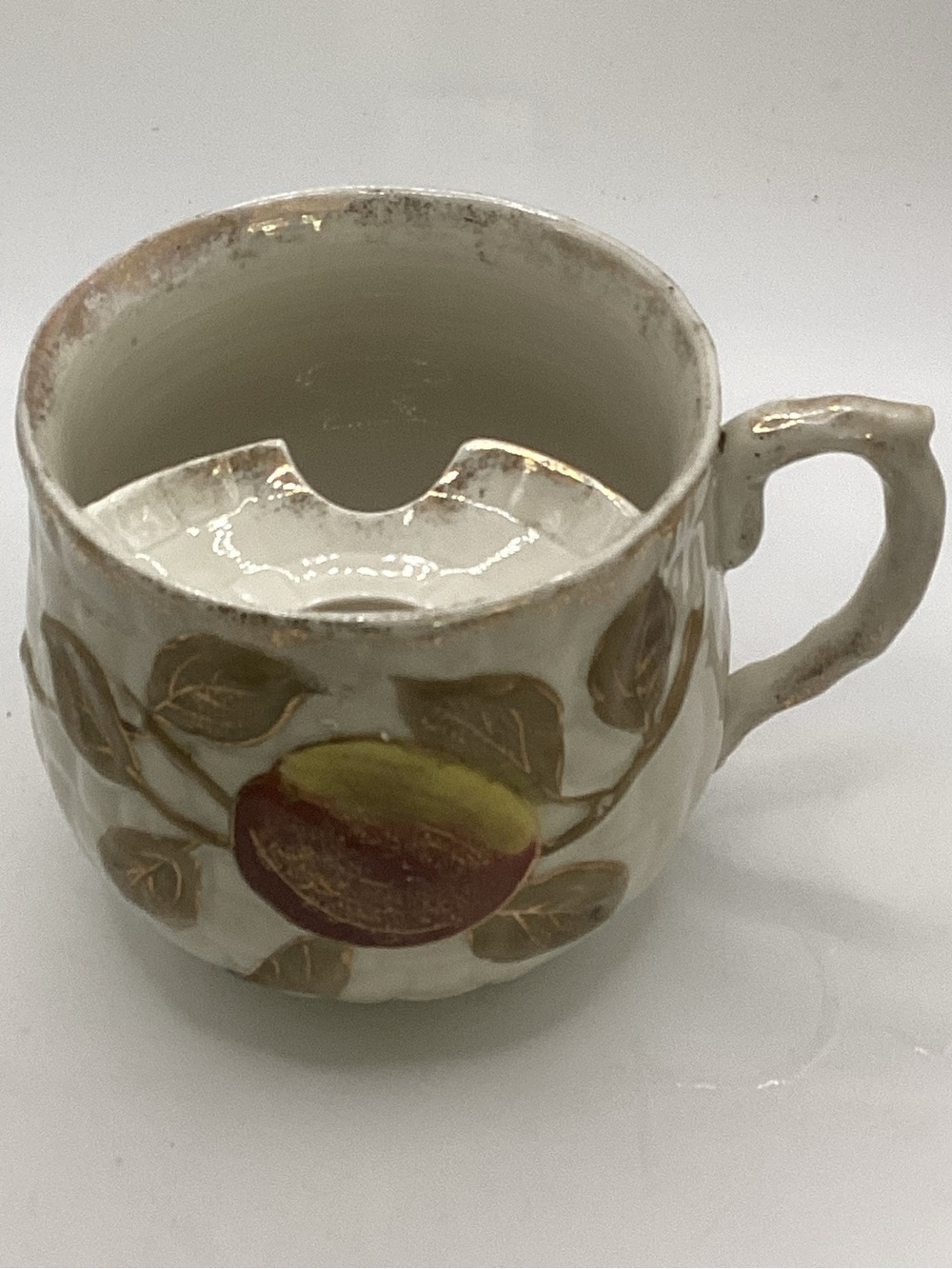 vintage mustache tea cup featuring a hand-painted apple